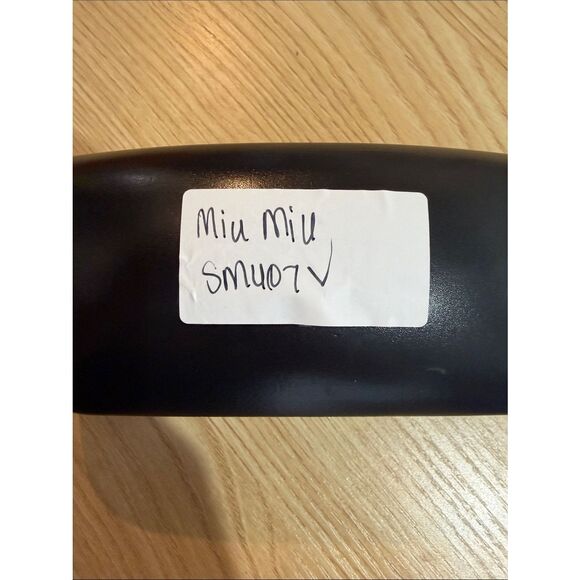 NWT Miu Miu Sunglasses • 55mm lens width; 12mm bridge width; 145mm SMU07V $440 main image 7